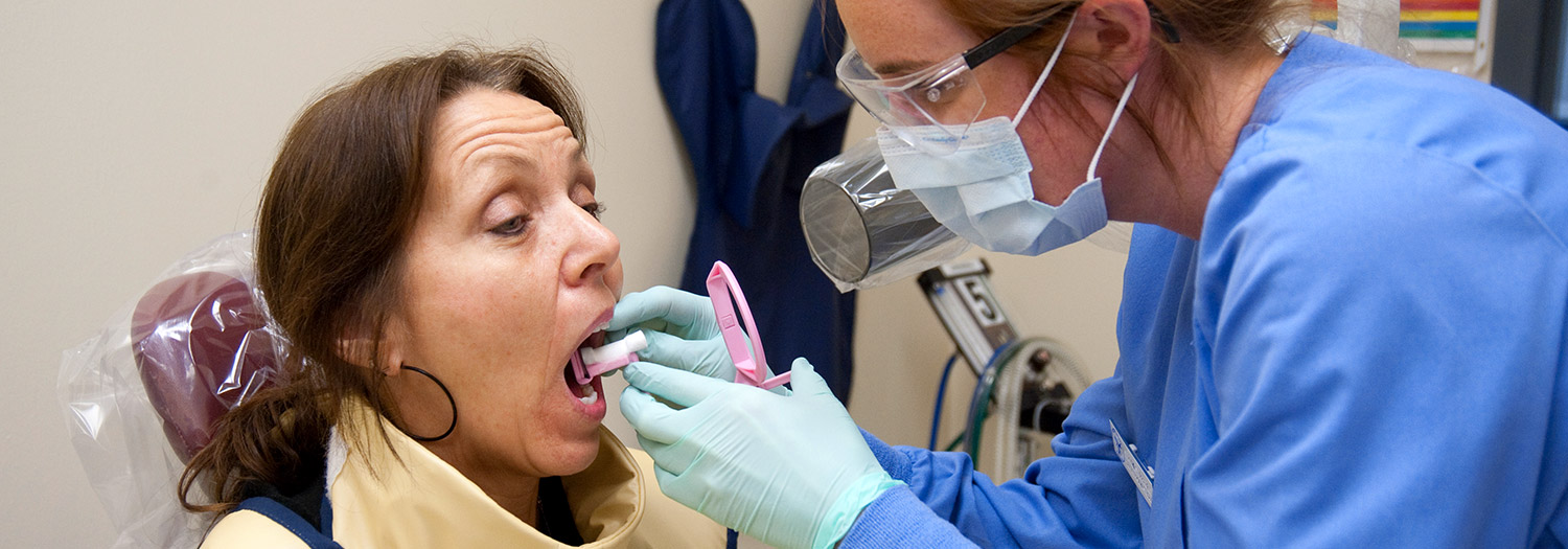 patient in lab getting a dental impression