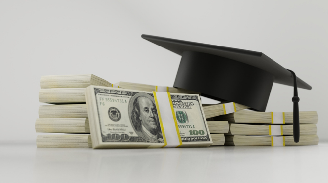 graduation hat and stack of money