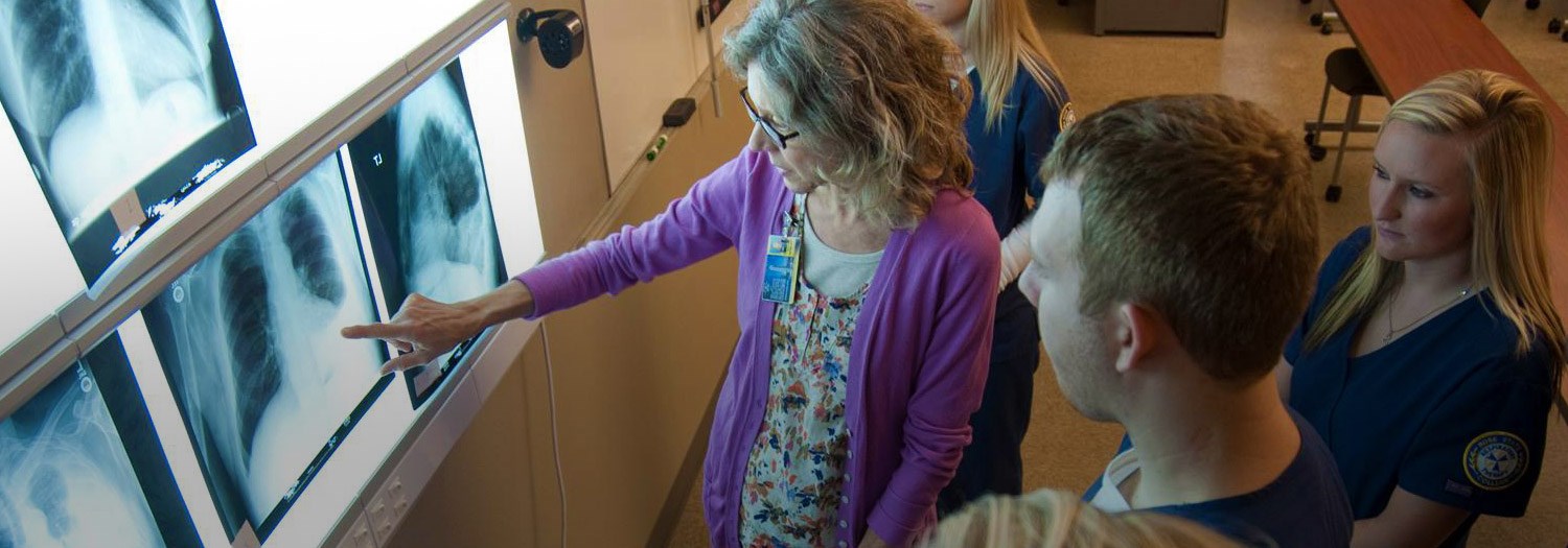 Respiratory students and professor viewing chest xrays