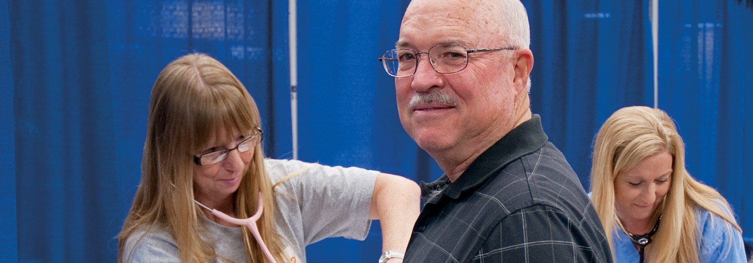 Senior citizen at a health fair held at the College