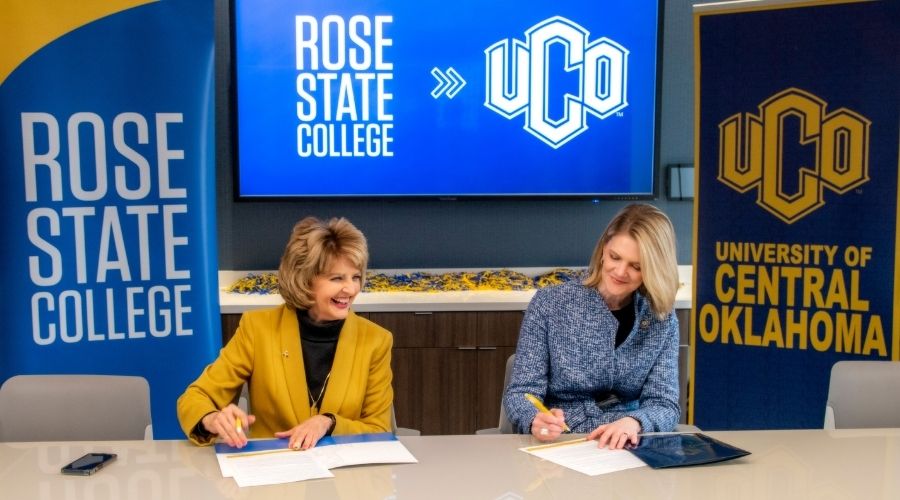 UCO President, Patti Neuhold-Ravikumar, and Rose State College President, Dr. Jeanie Webb sign a transfer student partnership agreement