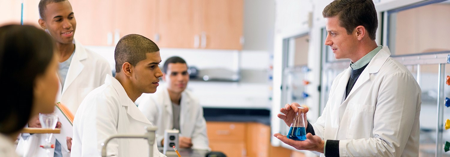 Five people in a lab environment