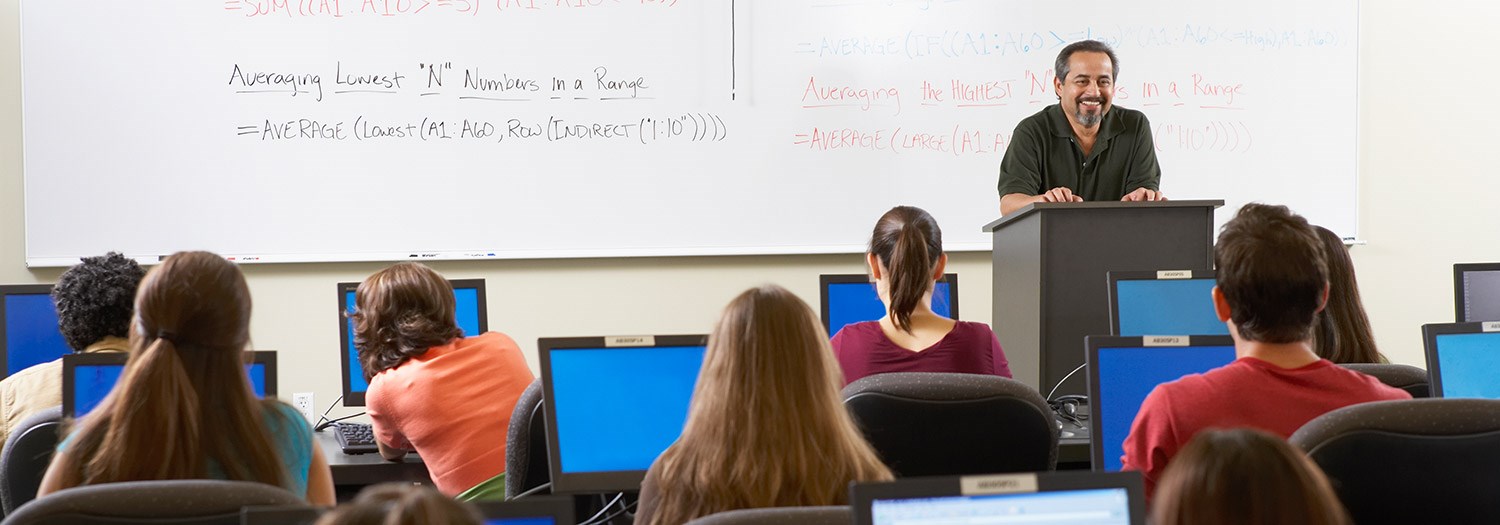 Professor in front of a classroom with students