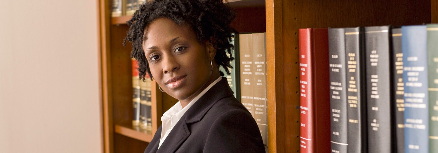 young woman in a law library