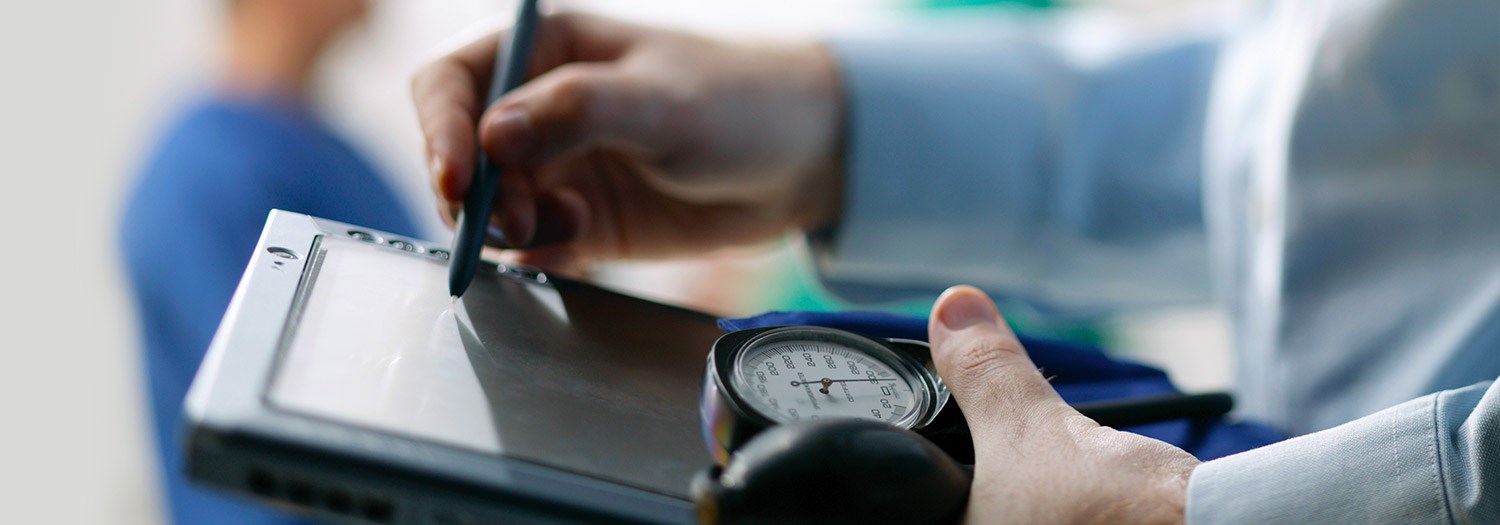 close up of person entering data on a tablet with a stylus