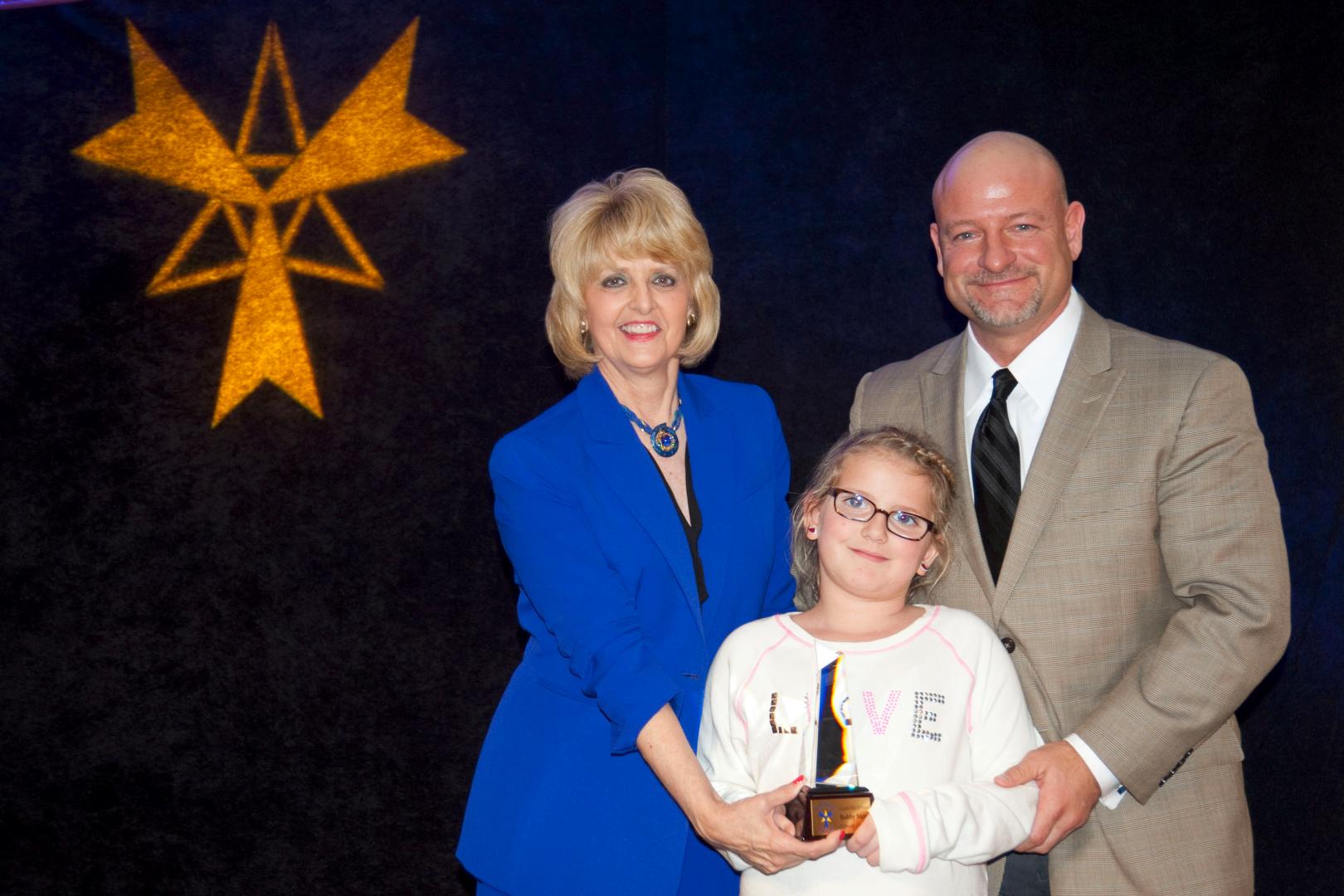 President Jeanie Webb, Bobby Stem, and daughter