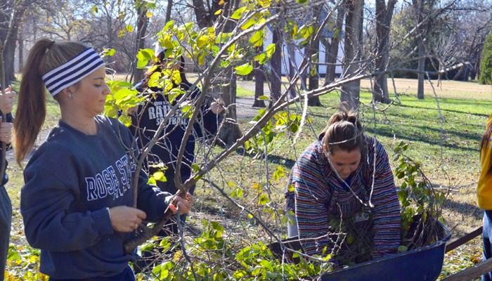 Rose State College Athletes Clean up Storm Damage at the Historic Harn Homestead